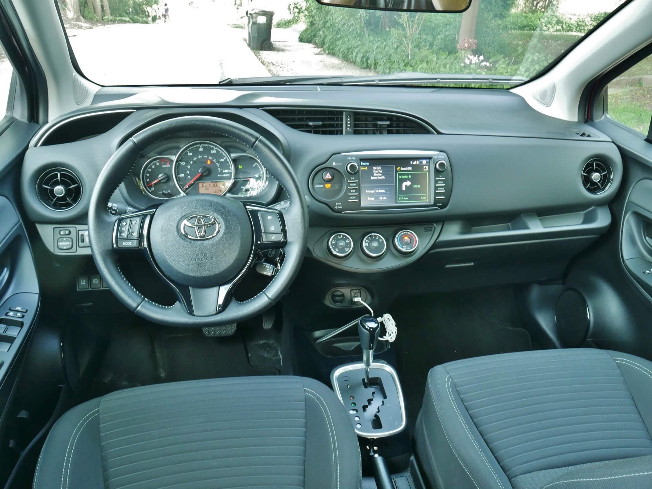 2018 Toyota Yaris 5 Door SE: Low cowl, upright driving position, large analog gauges, clearly marked & switchgear w/ available 7.0" touch LCD infotainment screen, mostly hard but tight grained low contrast plastics, limited secure storage