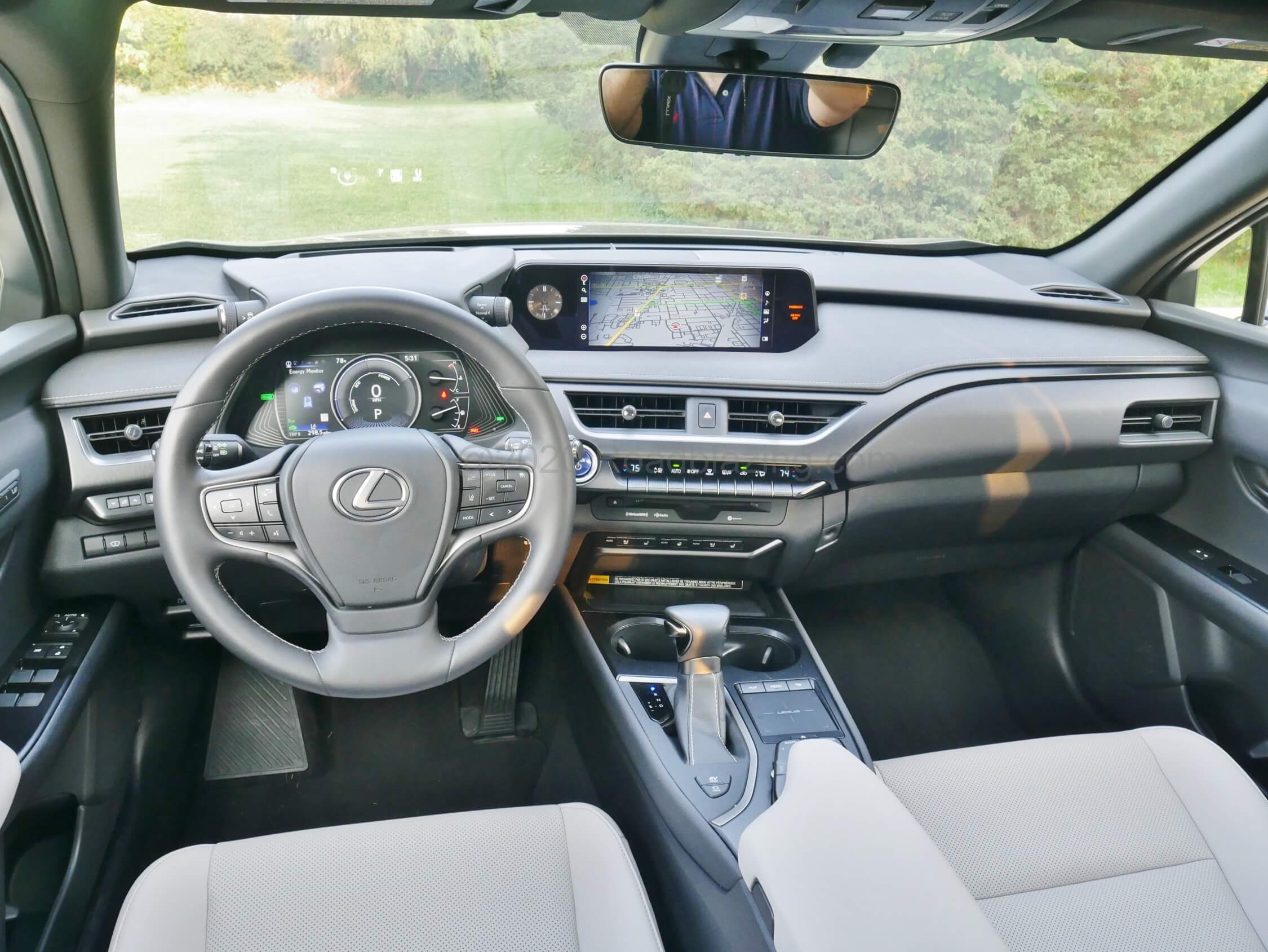 2020 Lexus UX 250h Hybrid AWD: tiered dash, fighter jet inspired instrumentation & remote touchpad controlled 10.3" infotainment display w/ navigation