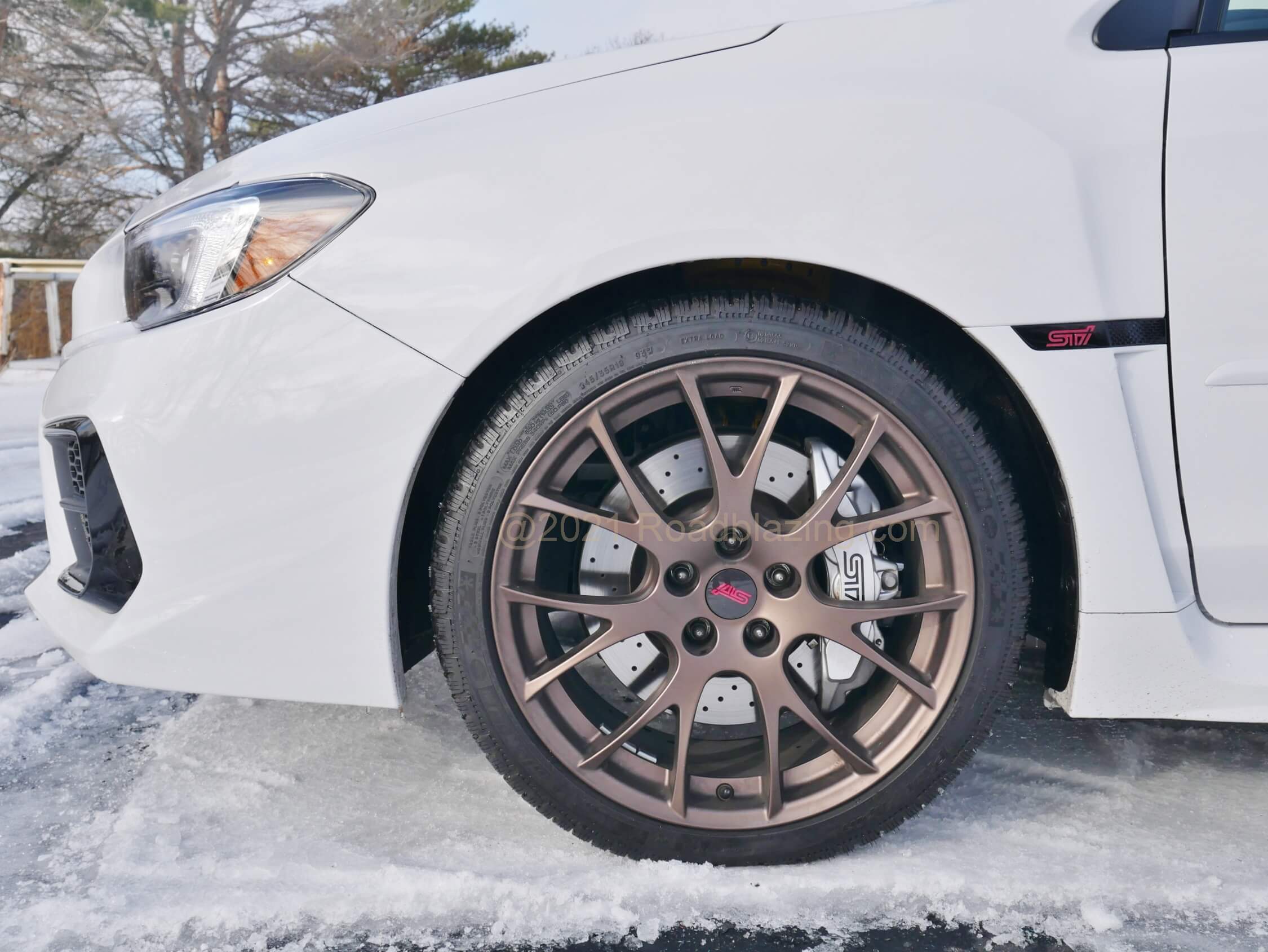 2020 Subaru WRX STI: Bilstein Sport dampers deliver taught body control w/o excessive harshness. Cross-drilled brake rotors fend off heat as 6-piston front Brembo binders clamp down. Tester was fitted with Michelin Alpin performance winter rubber.