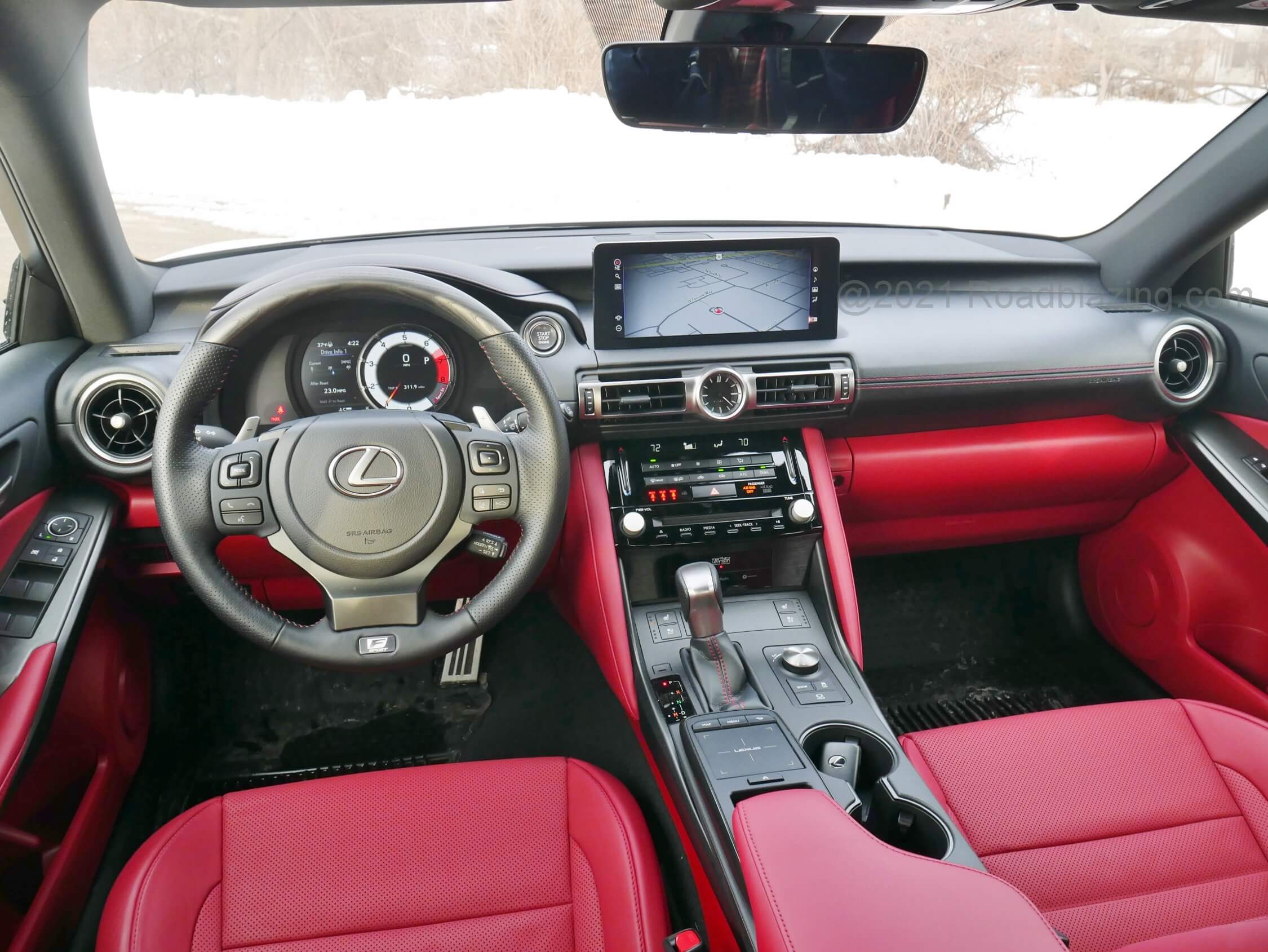 2021 Lexus IS 350 AWD: New 10.25" landscape pod infotainment meets revised steering wheel, touchpad infotainment remote, and retained electric sliding F-Sport gauge cluster