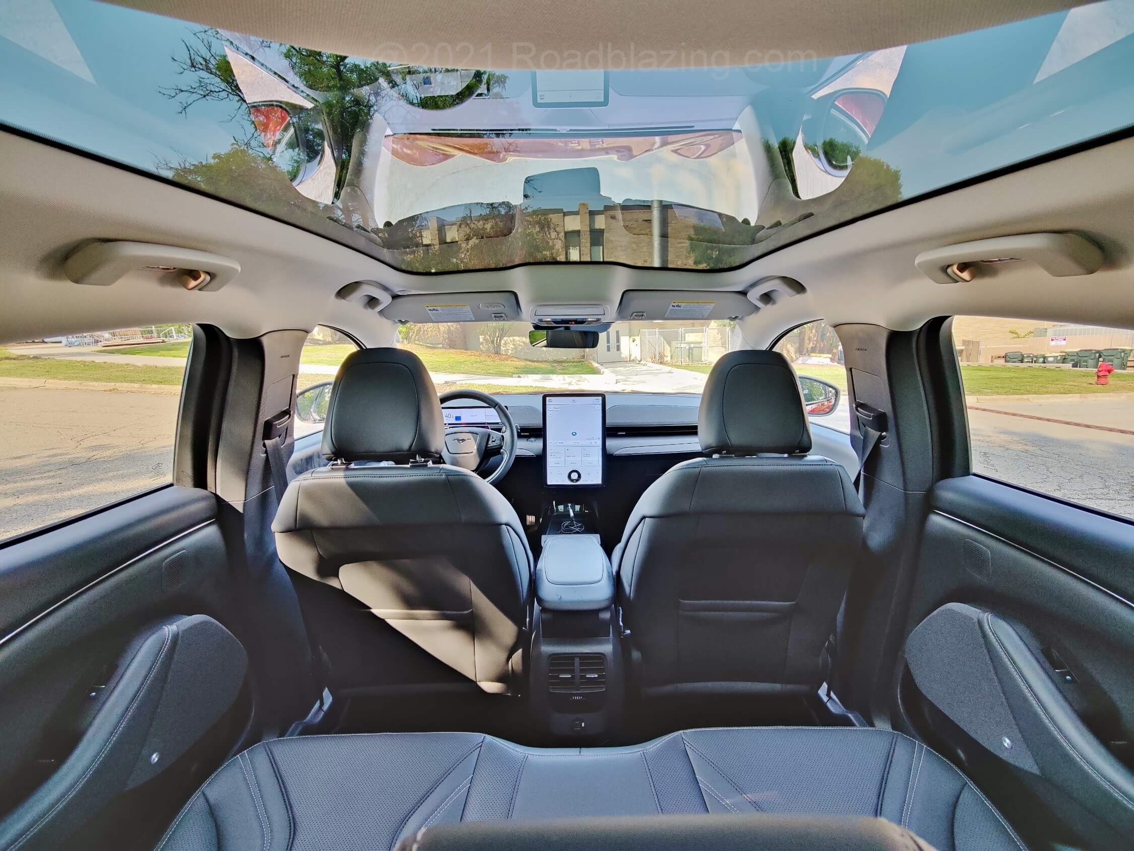 2021 Ford Mustang Mach-E Premium AWD: forward view of cabin and massive panorama glass roof