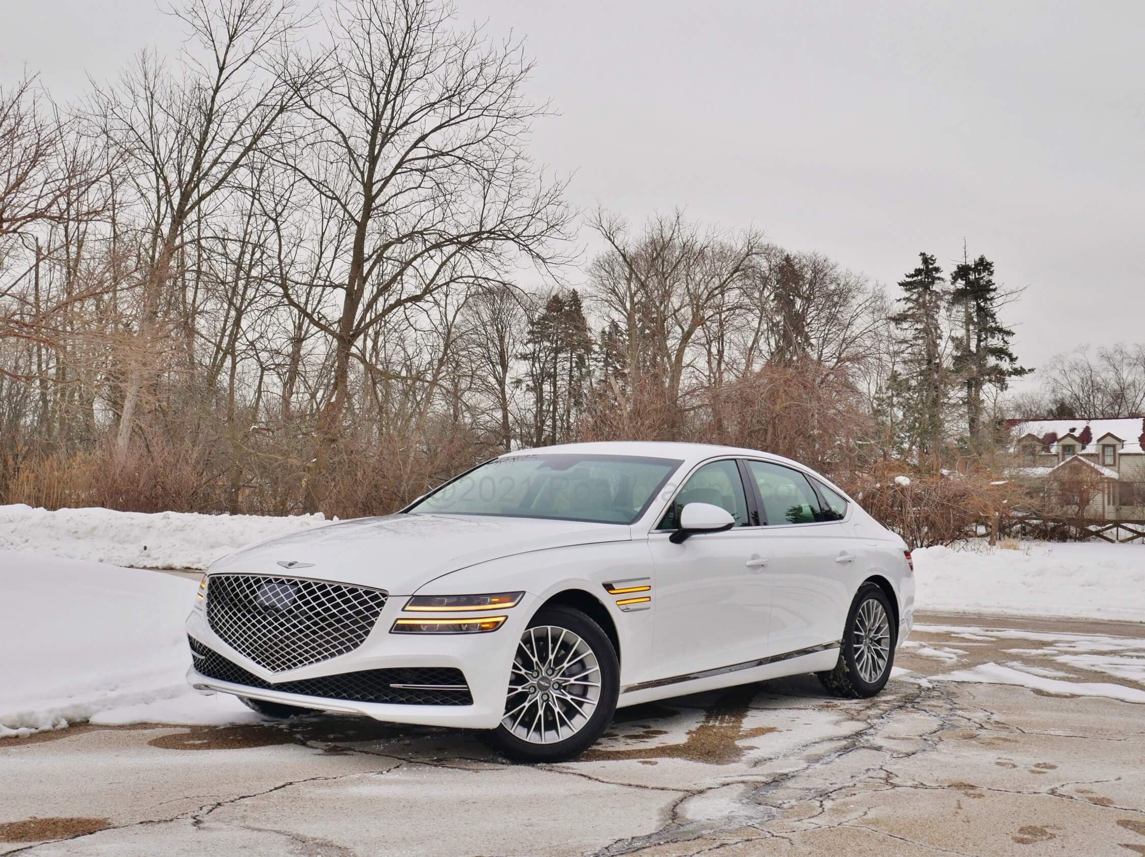 2021 Genesis G80 2.5T: Diamonds are forever in the grille and exhaust cutouts.