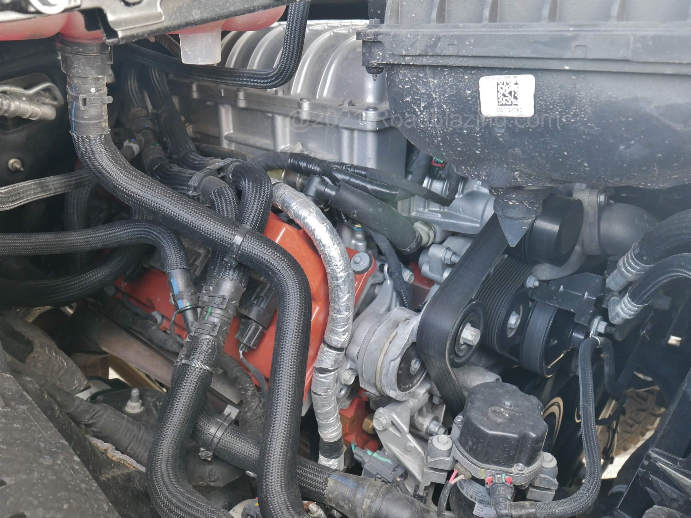2021 RAM 1500 TRX Crew Cab 4x4: twin screw supercharger feeds 6.2L OHV intake + 8 speed ZF transmission + BorgWarner electronic 2-speed 4WD transfer case