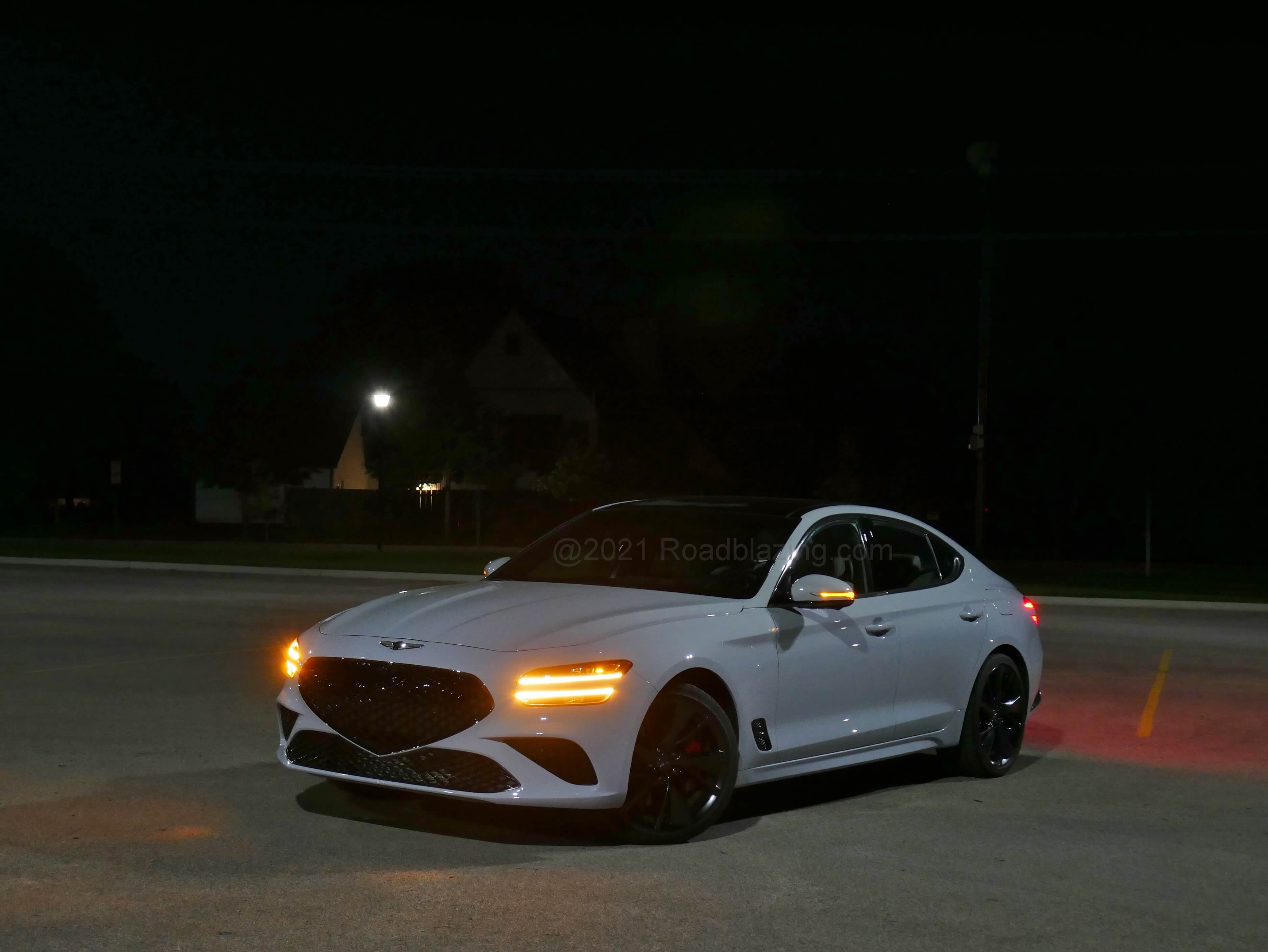 2022 Genesis G70 3.3T Sport: in Siberian Ice alit at night