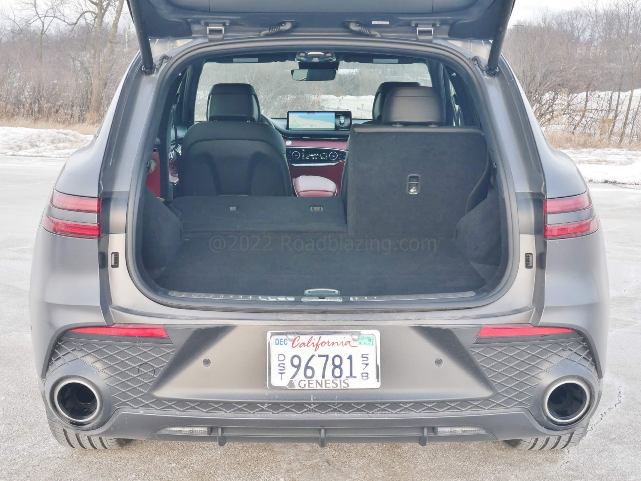 2022 Genesis GV70 3.5T AWD: approach activated power liftgate opens to cargo bay expandable via 60/40% split folding 2nd Row seatbacks