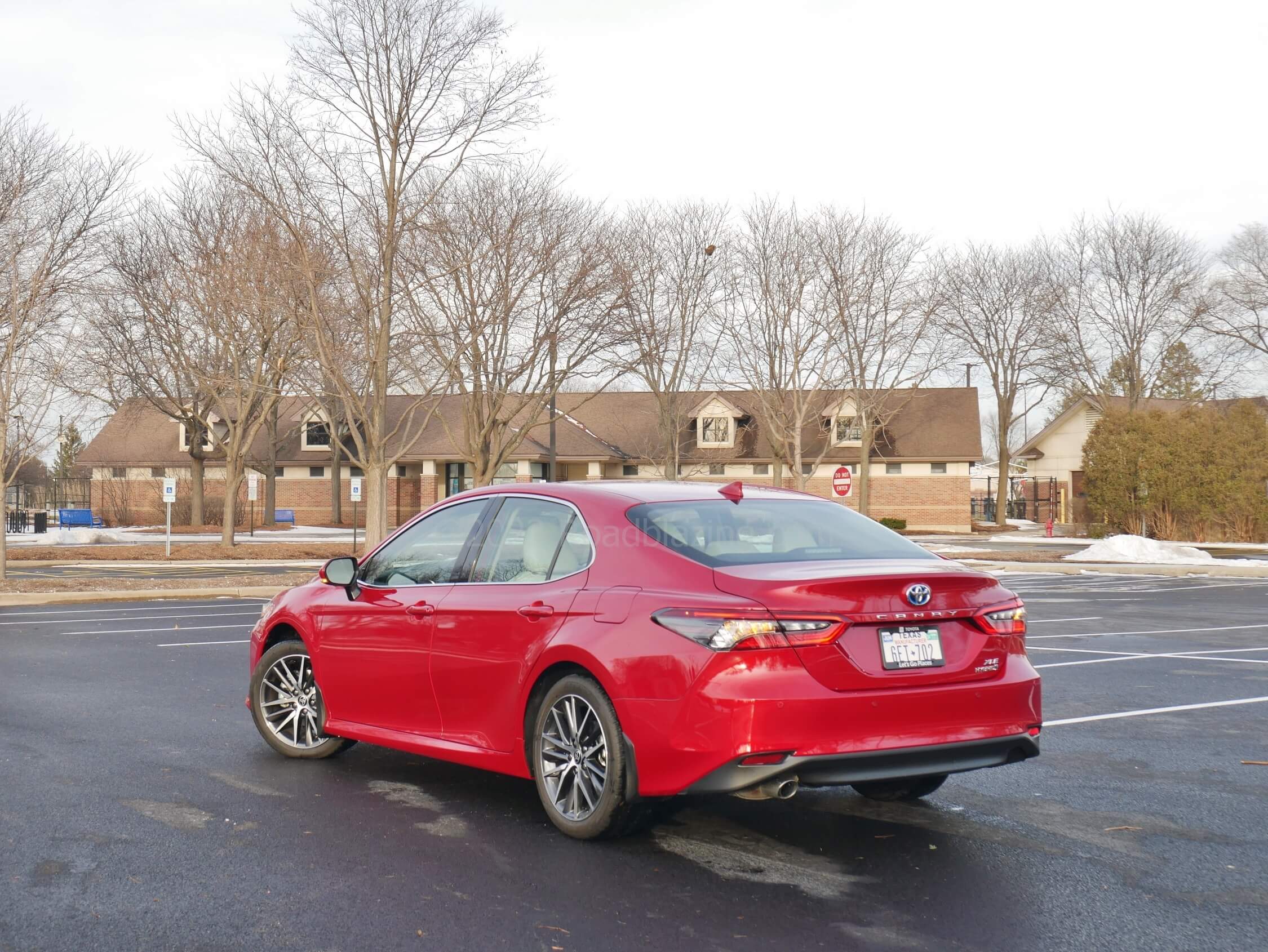 2023 Toyota Camry Hybrid XLE: athletic fenders + rear quarters are capped with aggressive nose + elegant tail