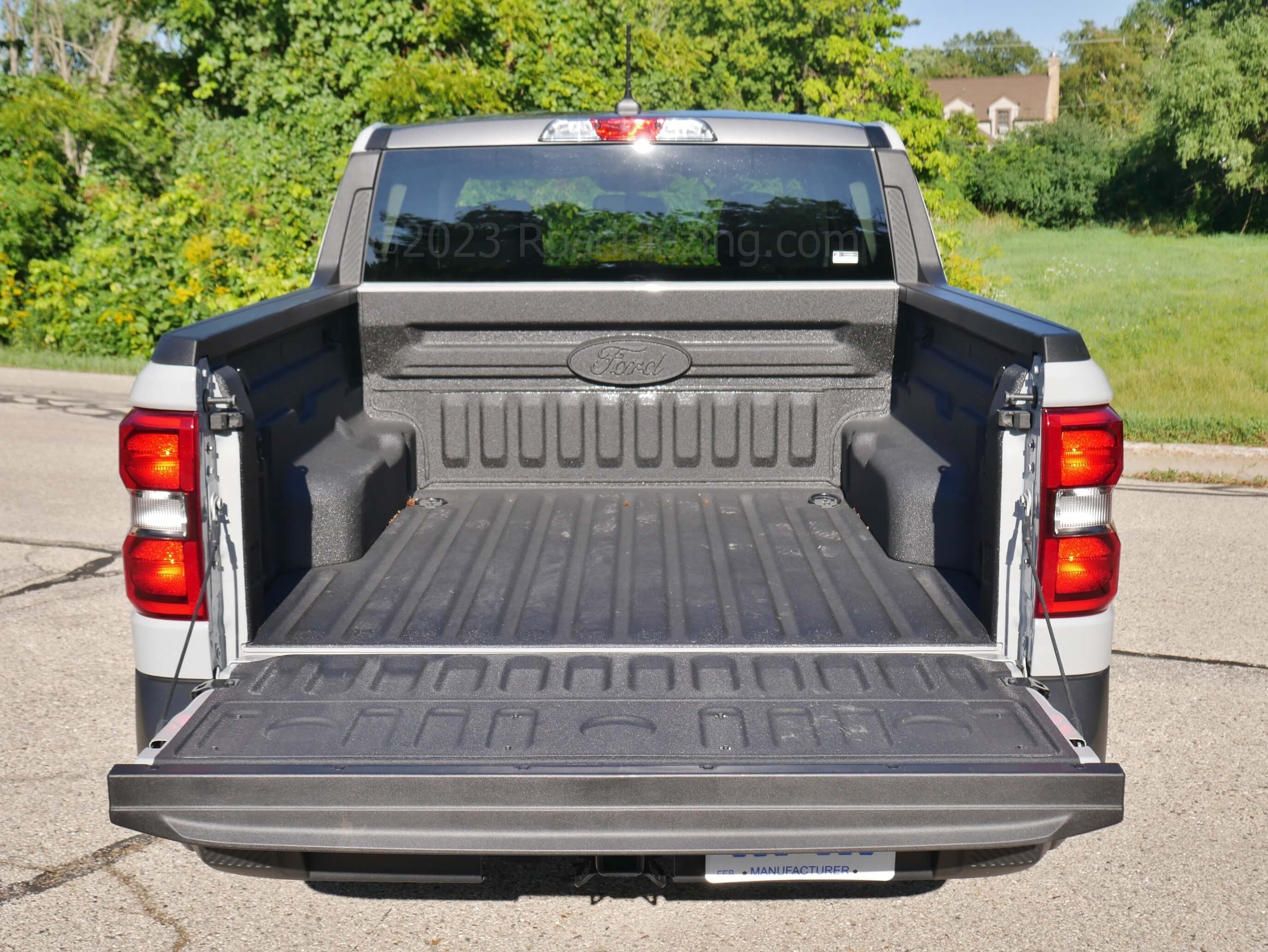 2023 Ford Maverick XLT Tremor AWD: 4.5 foot cargo box will take a 4x8 sheet of plywood above the planar wheel arches