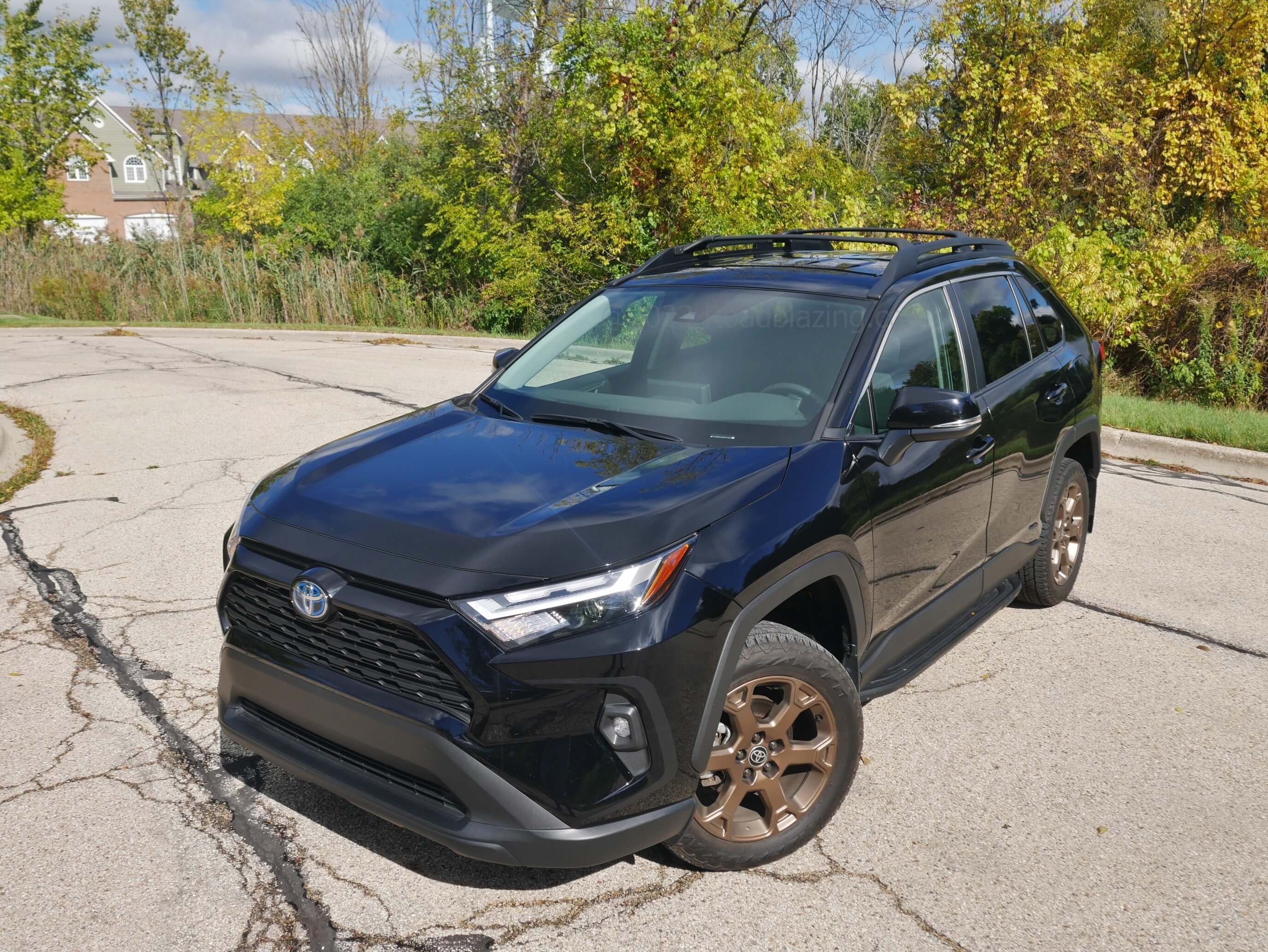 2023 Toyota RAV4 Hybrid AWD Woodland Edition: swept back windshield