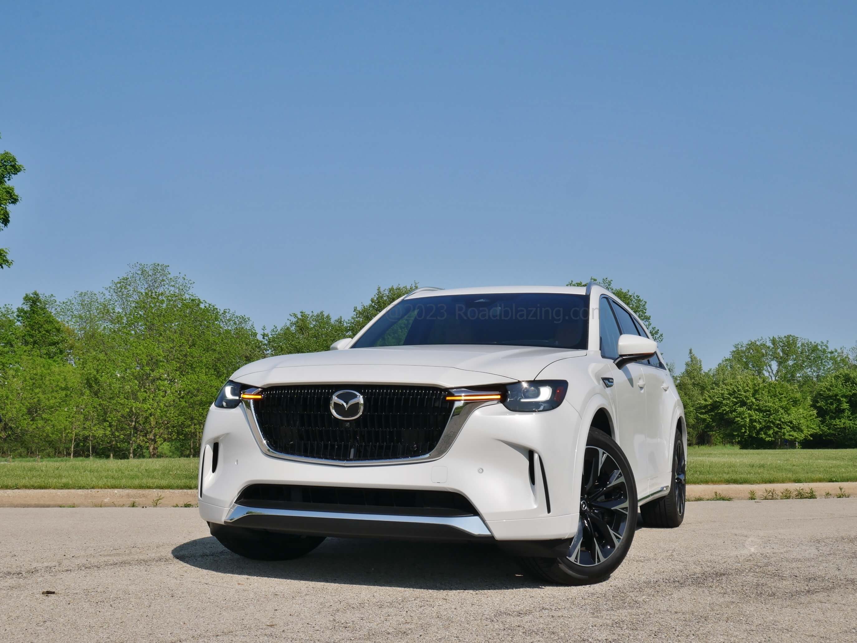 2024 Mazda CX-90 3.3 Turbo S Premium Plus AWD: Waterfall straked grille features concave fold complemented by smooth vertical corner folds