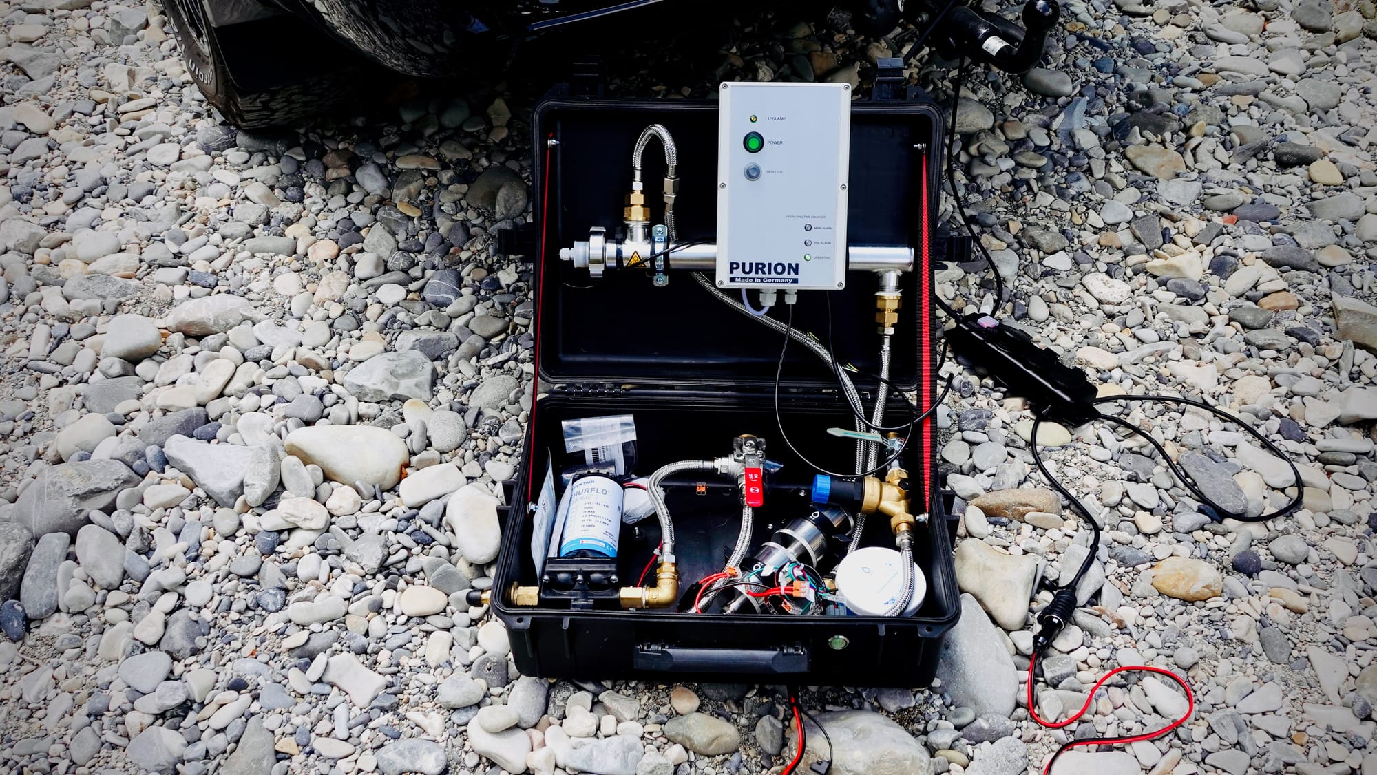 Multi-stage water filtration case for overlanders