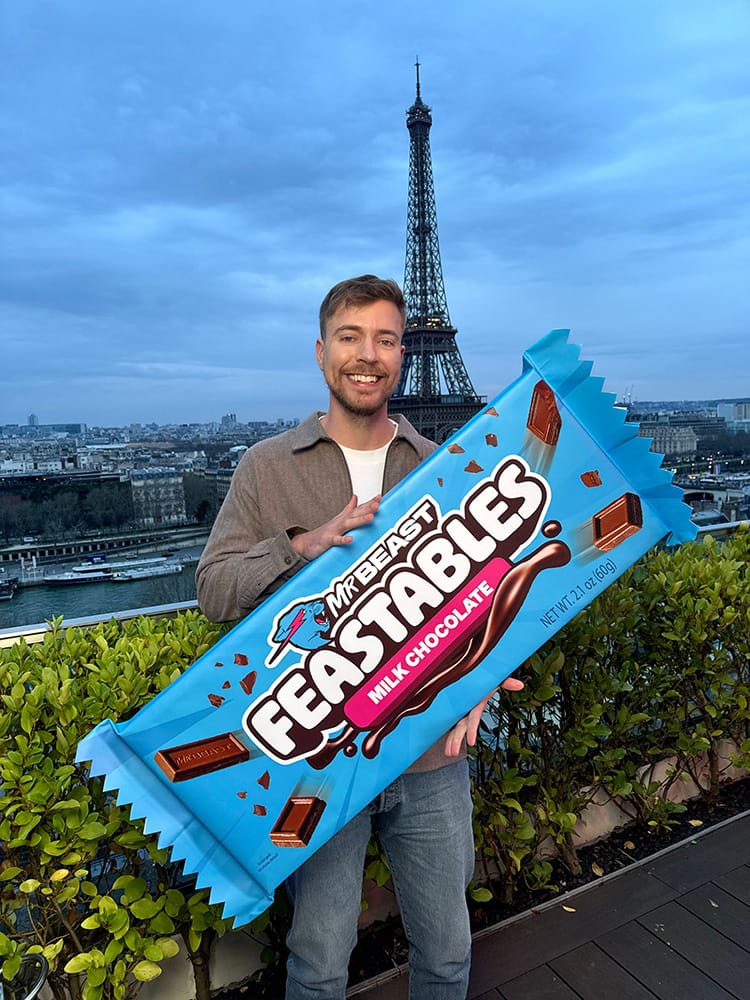 Image shows Mr Beast, aka Jimmy Donaldson in Paris - with his chocolate.