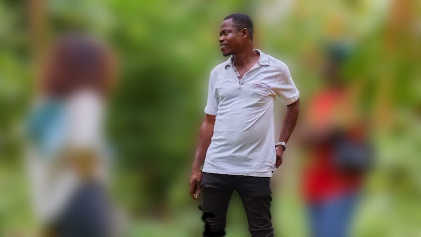 Image shows cocoa farmer John Adamanor.