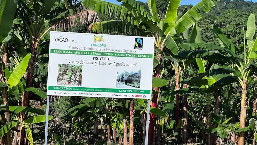 Image shows a sign outside the YACAO organic farm in Dominican Republic