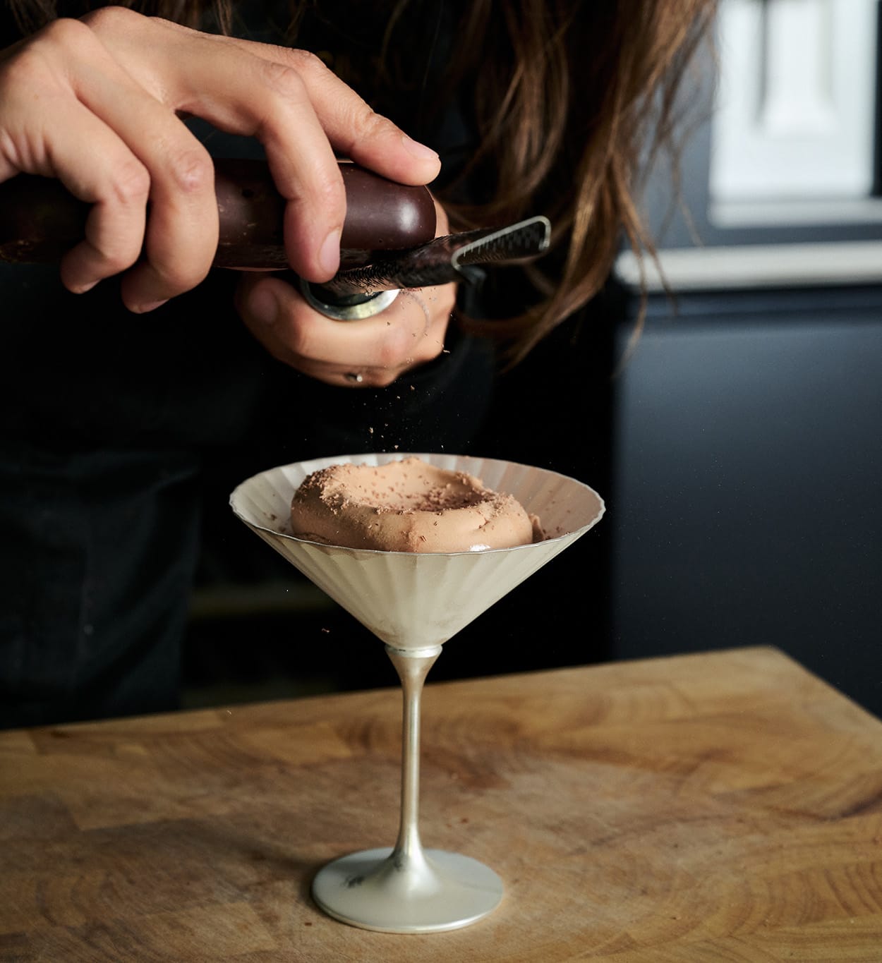 Image shows a chef working with Original Beans chocolate