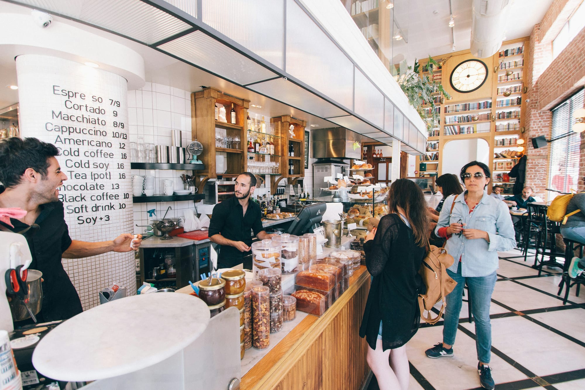 Image shows a typical coffee shop to isslutrate use of Arabica Coffe