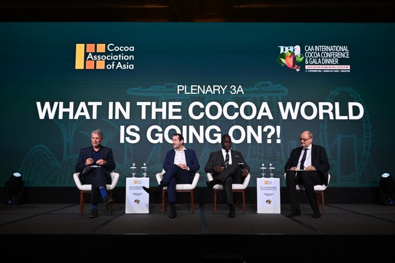 Image shows The What In The Cocoa World Is Going On?! panle at the CAA Conference with Anthony Myers (far left) and Chris de Lavigne, Wisdom Kofi Dogbey and Michel Arrion.