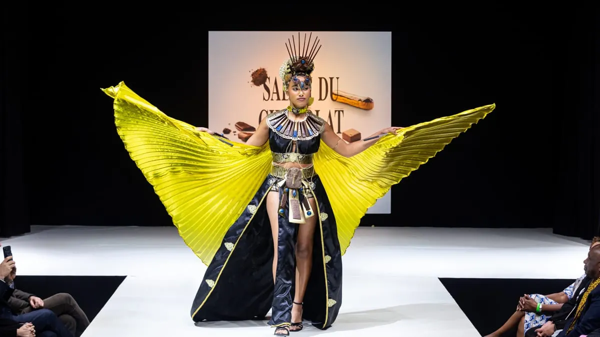 Photo shows a model on the catwalk at Salon de Chocolat, Paris.