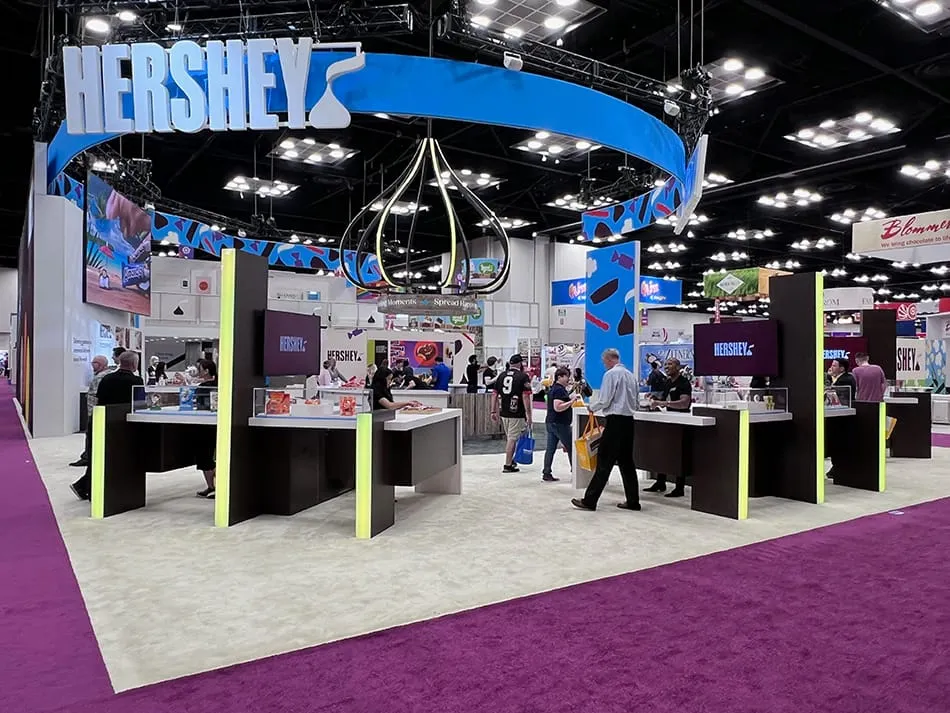 Image shows a Hershey booth at the Sweets & Snacks Expo.