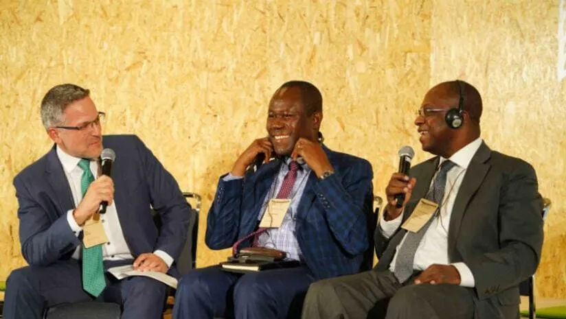 Image shows: Tim McCoy with Joseph Boahen Aidoo (Ghana Cocoa Board) and Yves Brahima Koné (Le Conseil du Café Cacao) 
