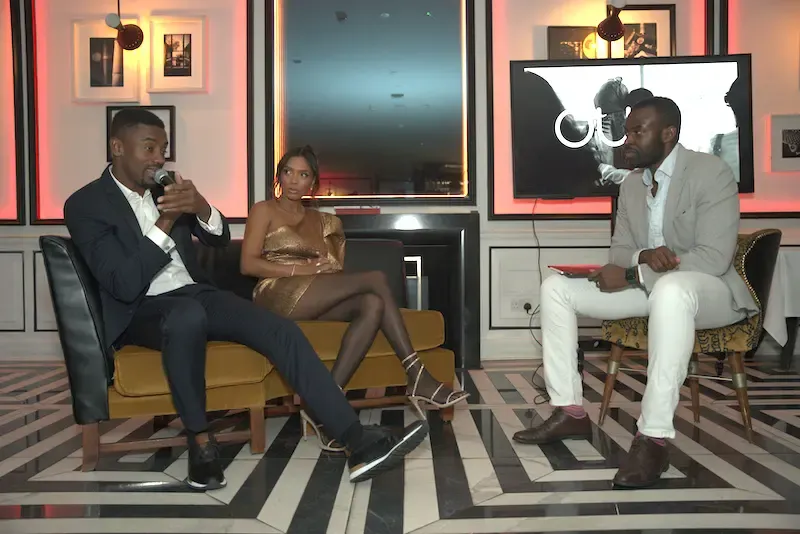 Image shows Salomon Kalou and creative director Karina Ferreira chatting with creative director Ndubuisi Kejeh at a private pre-launch in London for Oumé chocolate