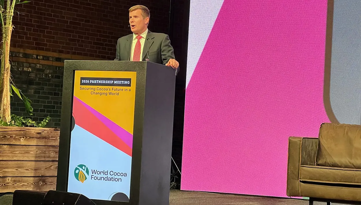 Image shows Chris Vincent, President of the WCF, speaking at this year's Partnership Meeting in Amsterdam.