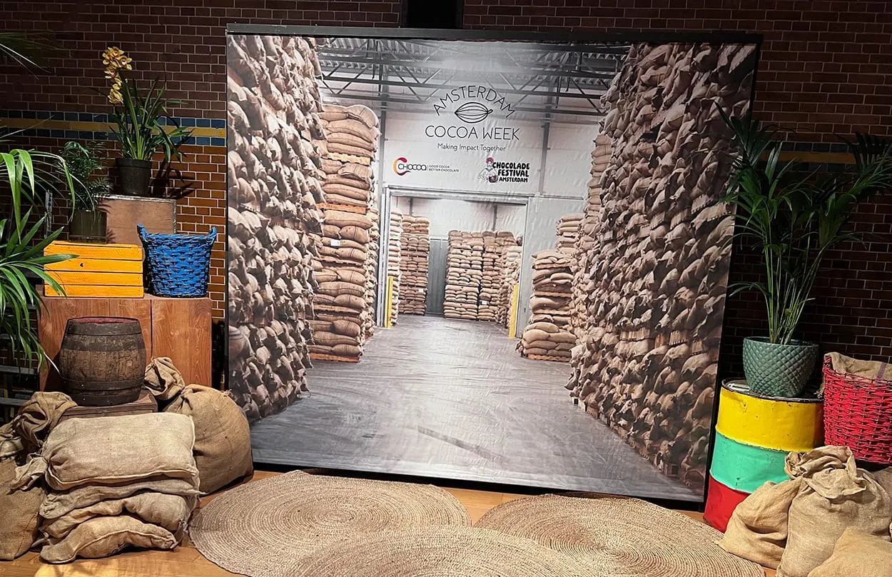 Image shows a dispays of cocoa sacks in the foyer of Chocoa 2026 Conference