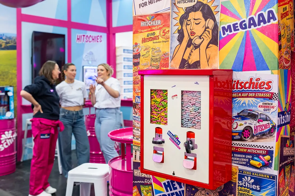 Image shows a colourful confectionery booth at ISM 2026.