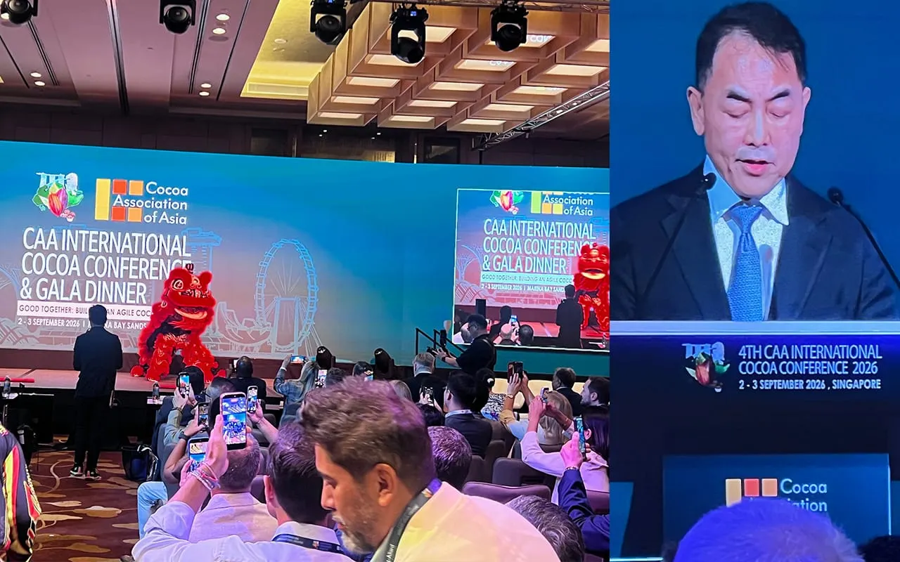 Image shows Brandon Tay from the CAA opening the conference after a traditional display.