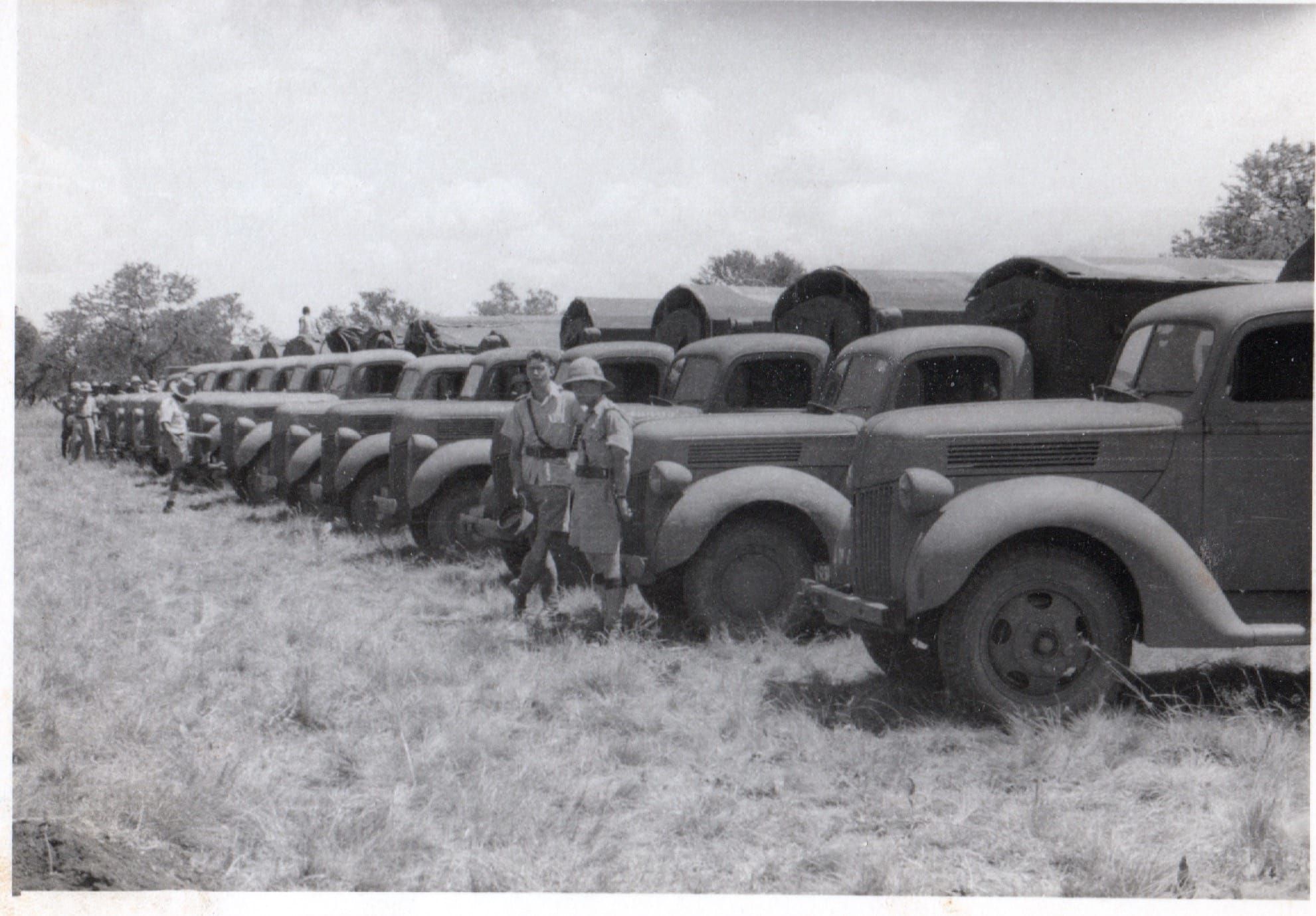 After triage and stabilizing the Italian casualties, the convoy of ambulances transported the patients 300 miles away to base camp, returning with much needed supplies, November, 1941. 