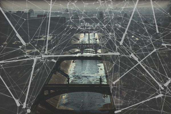 An artistic rendering off the Los Angeles River and Arts District draped in a complex net with a section pulled back offering a clear view.