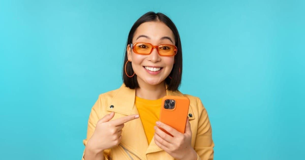 A woman excited about cell phone service trials