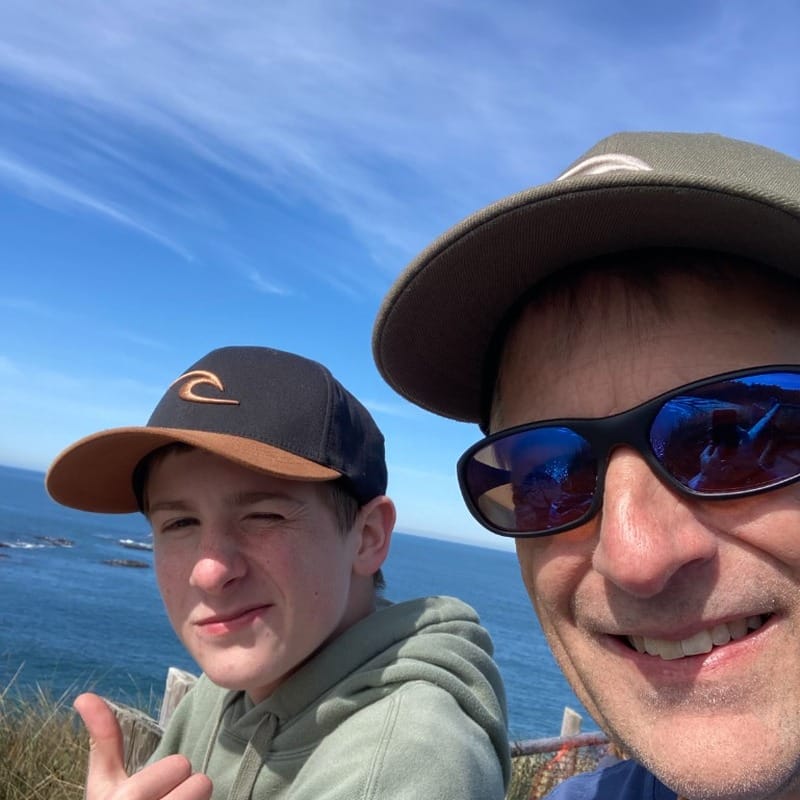 Joe Johnson with his son Emet after surfing on the Oregon coast.