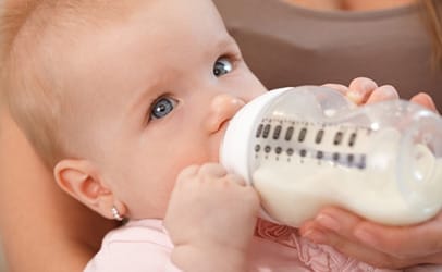 http://www.dreamstime.com/stock-images-closeup-beautiful-baby-nursing-bottle-close-up-photo-girl-drinking-milk-image39246184