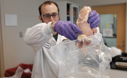 Marc Carpenter, a USDA scientist who works with the Food Emergency Response Network (FERN), helps prepare samples to be shipped to six labs across the country from Virginia’s Division of Consolidated Laboratory Services in preparation for the Democratic national convention. 