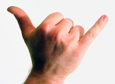 Shaka sign thumbs up in Hawaii