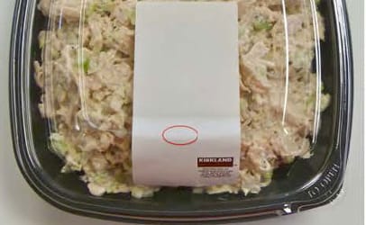 This product photo is posted with the public health warning regarding Costco chicken salad.
