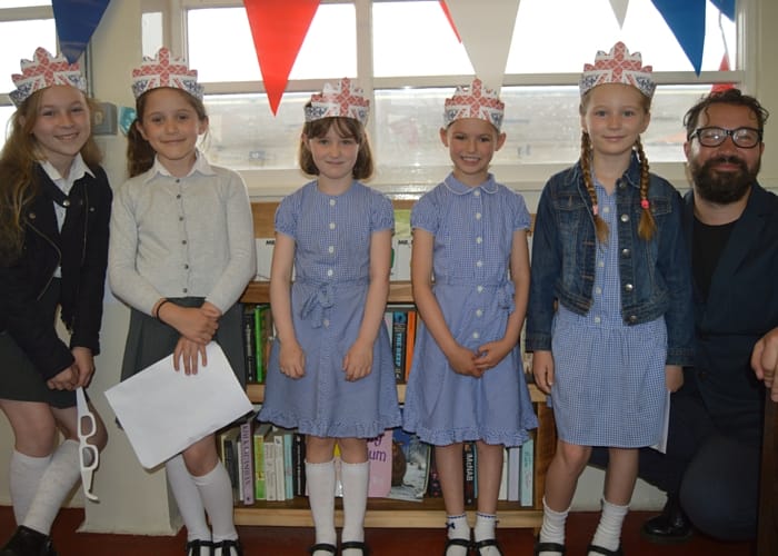 Charles Lea with local school children at the launch