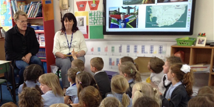 Eddie Izzard talks to school children at St Bridgets