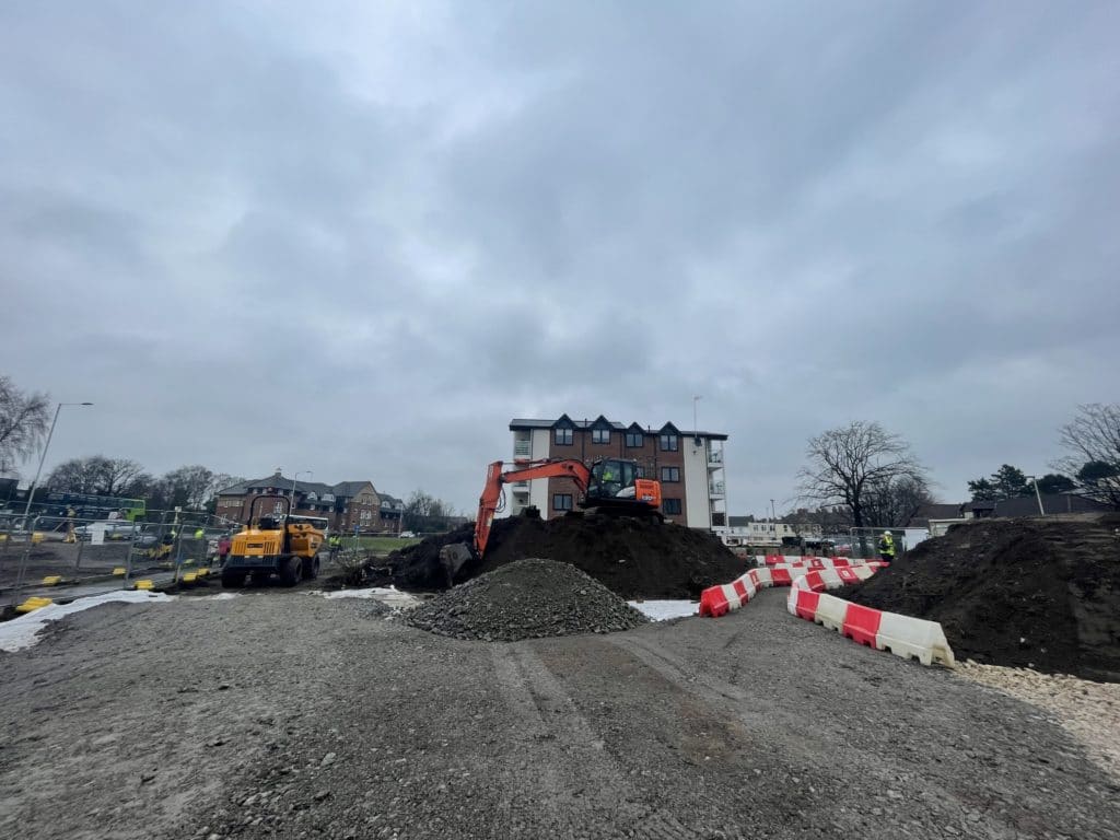 A digger starts work on the new Marine Lake Health and Wellbeing Centre, in West Kirby.