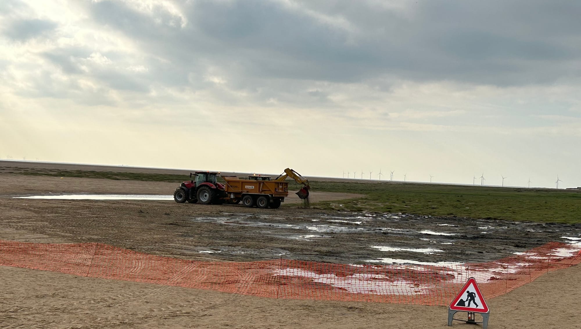 Grass removal taking place at West Kirby beach