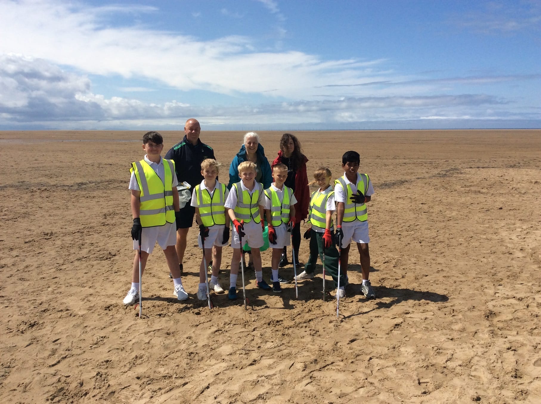 School pupils join beach litter clean-up