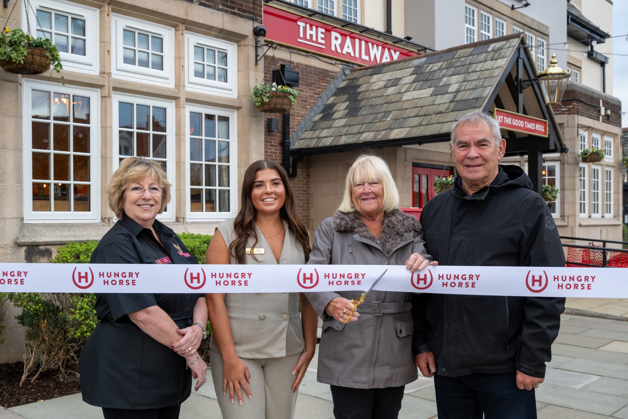 Railway regulars cut ribbon at reopening