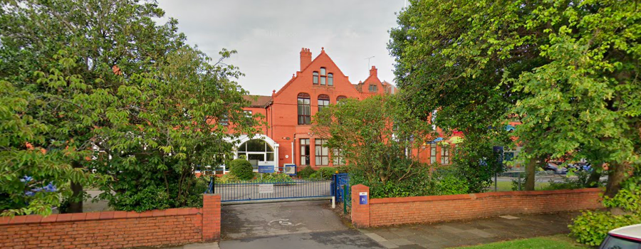 Schoolboy injured after falling from drainpipe