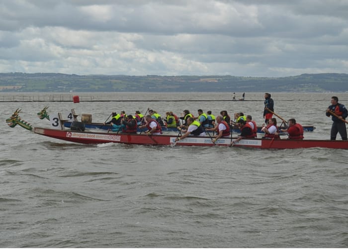 Teams racing in the annual dragon boat race