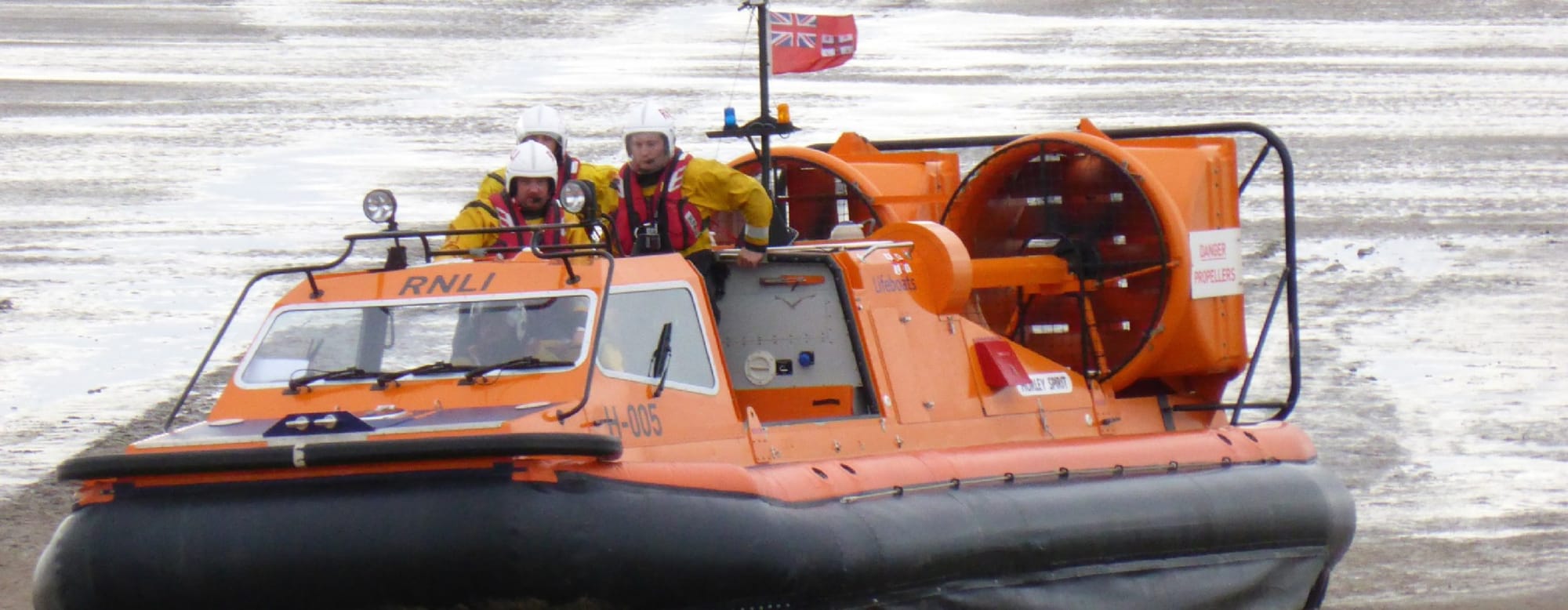Walker with four dogs rescued by RNLI hovercraft at Meols