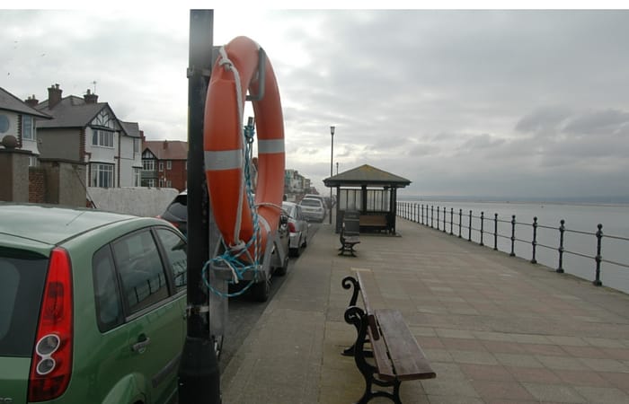The wall will follow the line of the street lights and seats