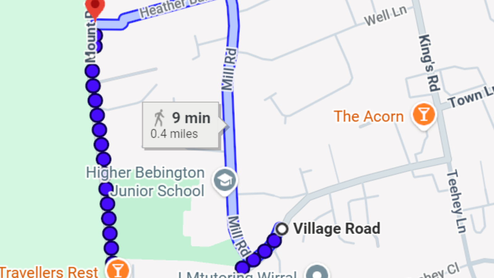 The junction/turning from Mount Road onto Village Road displayed.