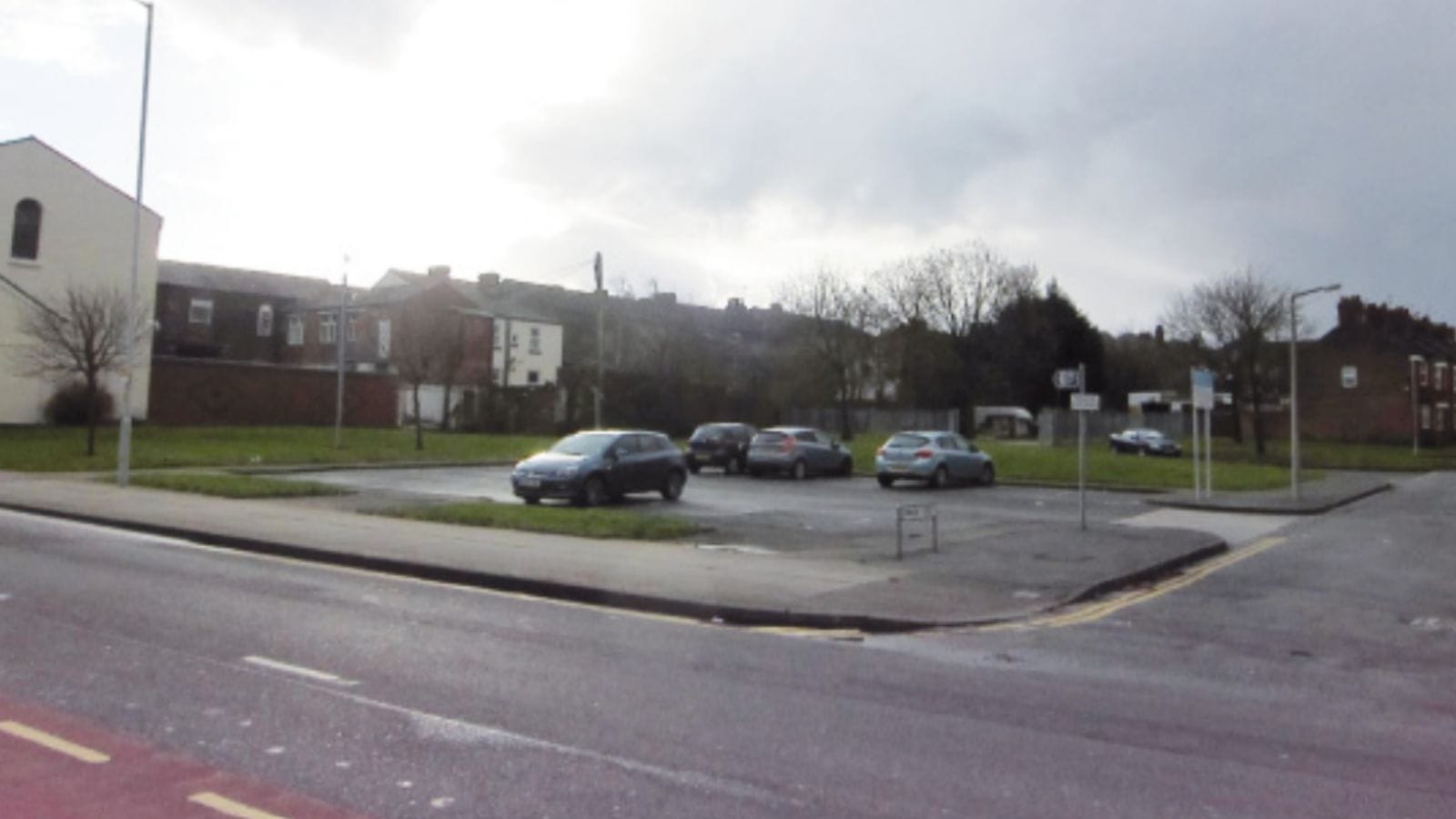 A car park/unused land on Howson Street.