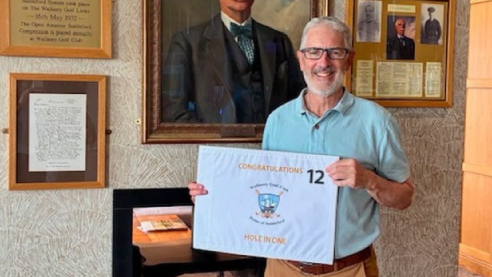 Man happy about 12th hole hole-in-one in Wallasey.