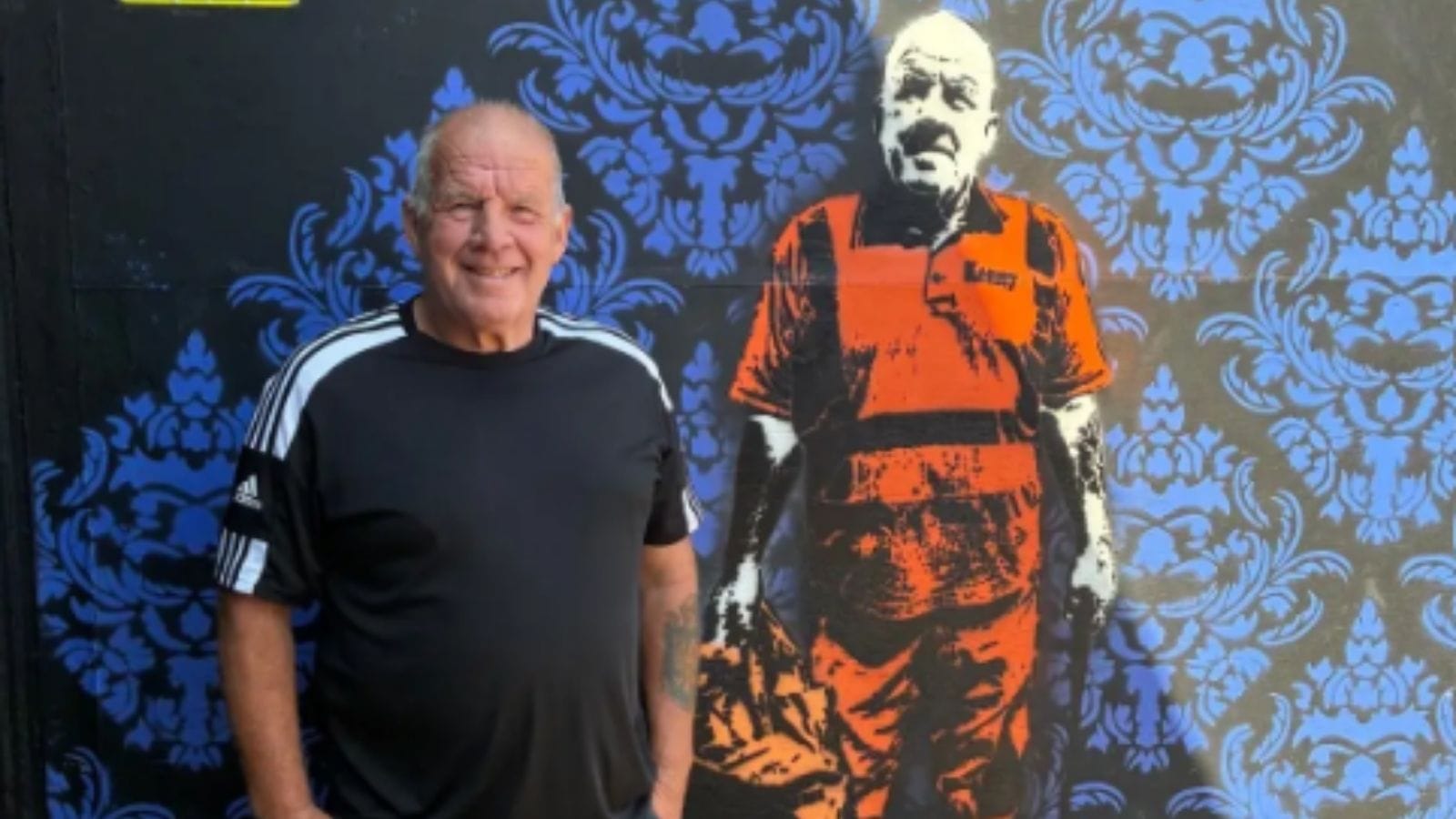 Kenny and his mural.